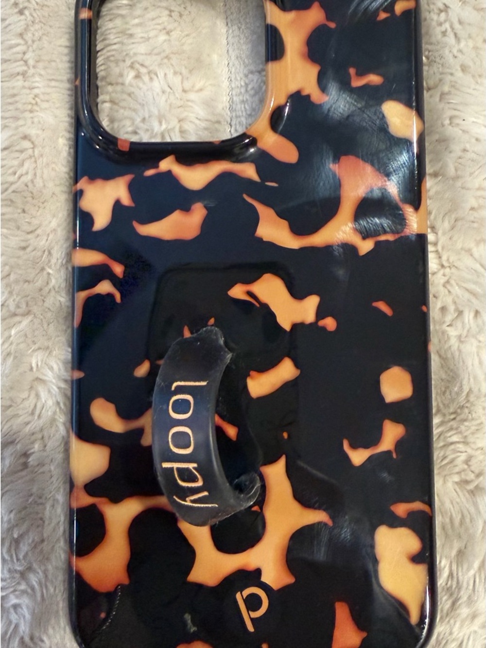 Loopy Tortious 14 Pro iPhone case with loop